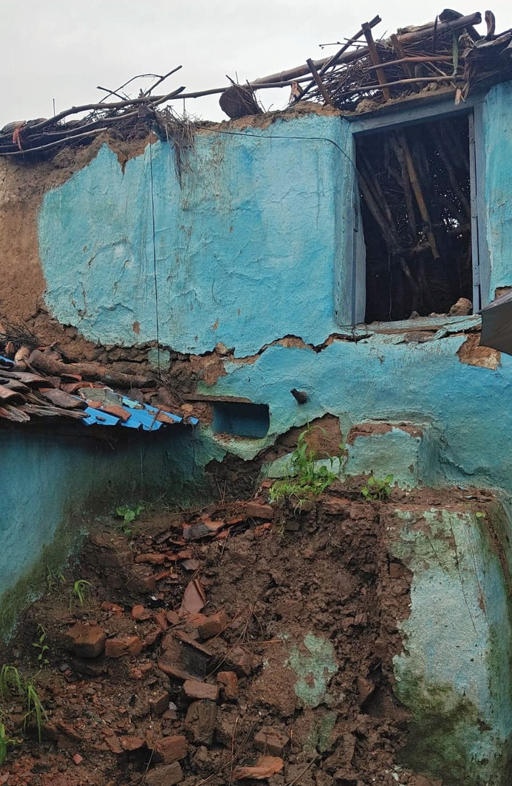 16 mud houses collapsed due to rain; households ruined.