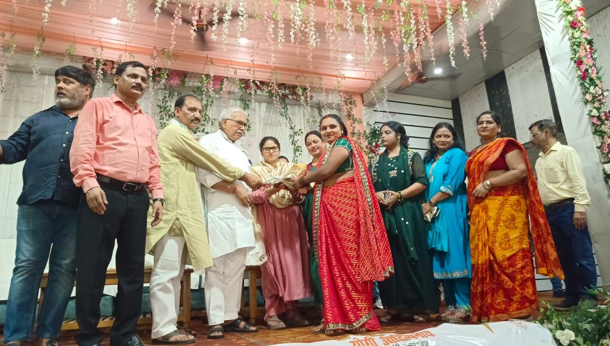 Sarees and sweets were distributed to 700 women