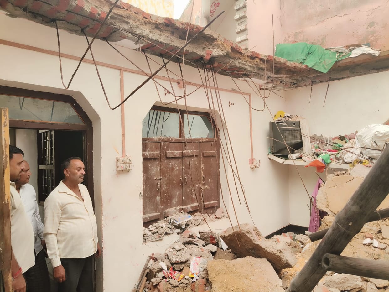Ration shop's concrete roof collapses suddenly; dealer's family escapes unhurt.
