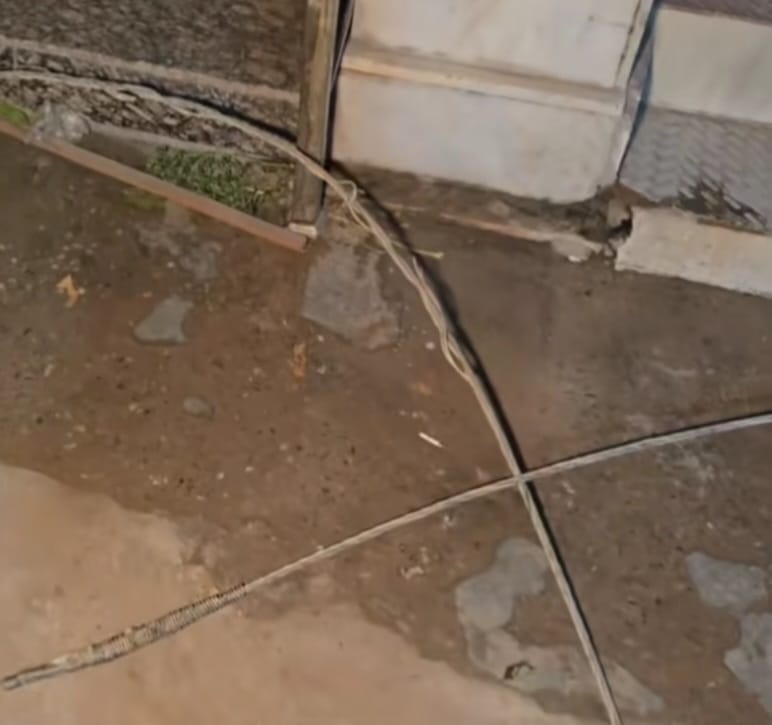 Bike rider has a narrow escape after high-tension wire snaps in Sadar Bazar.