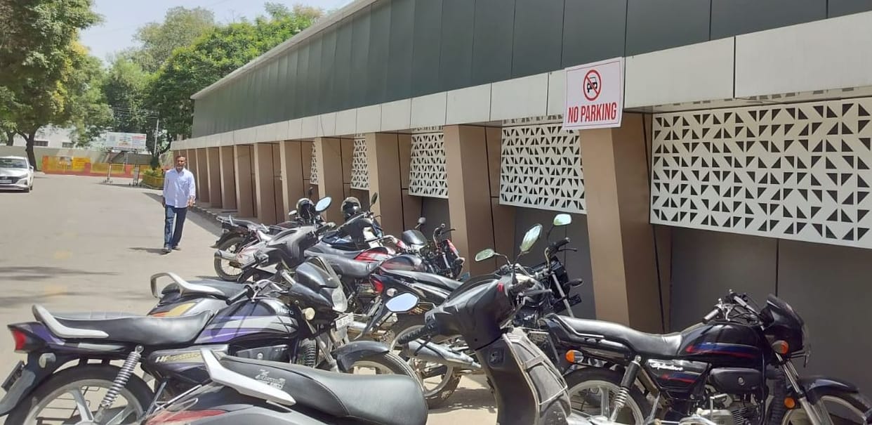 No parking signs are also ineffective, vehicles are parked on all three sides of the emergency.