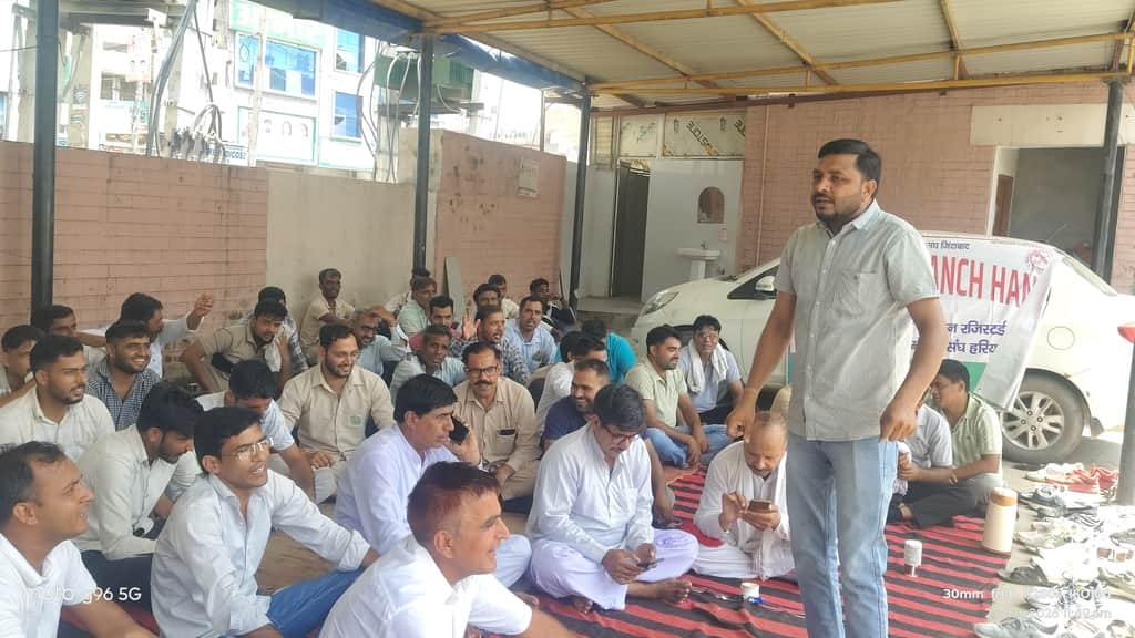 Officials accused of discrimination; employees staged a three-hour protest.