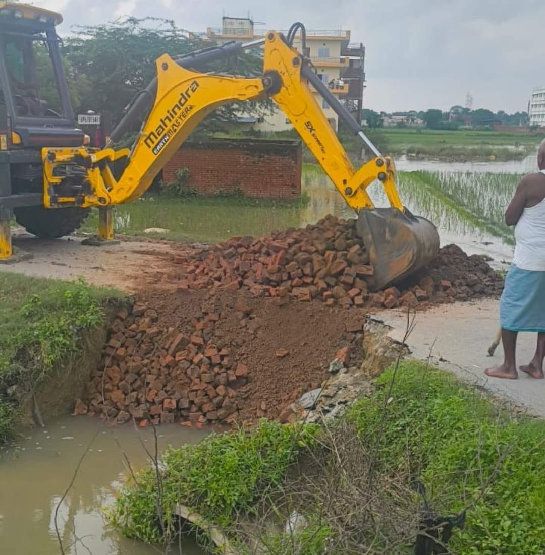 Road washed away by rain; a dozen villages cut off.