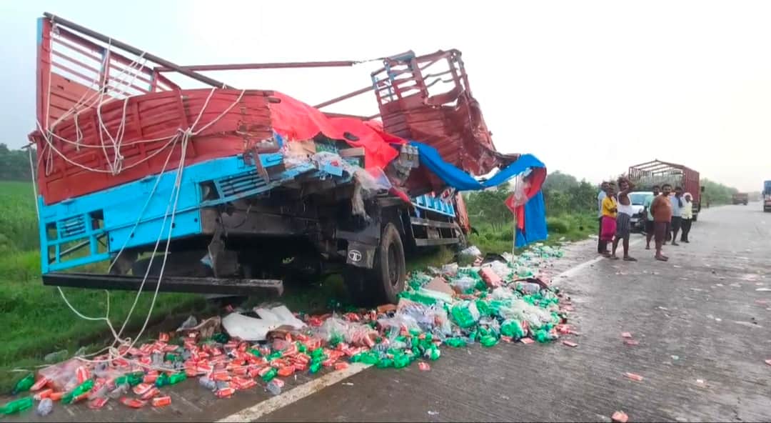 Trailer rams into DCM truck loaded with soft drinks from behind; driver flees.