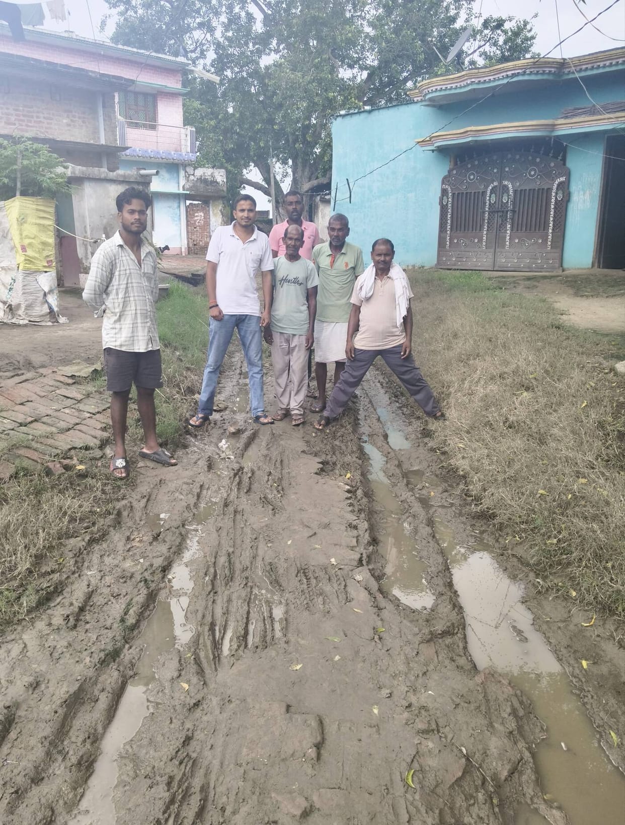 The main road of the village was submerged in mud