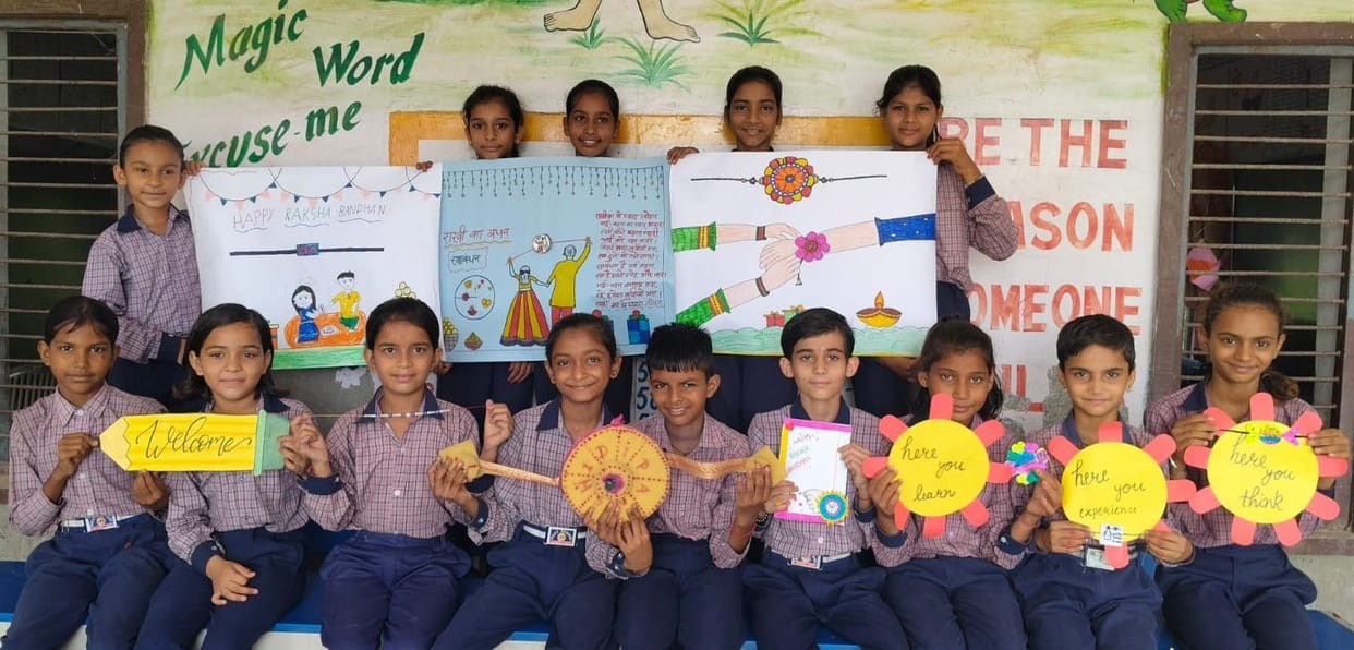 Children displayed their talent in the Mehndi competition, sisters tied Rakhi to their brothers.