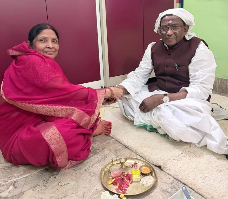 Assam Governor Laxman Acharya got his sister to tie a Rakhi.