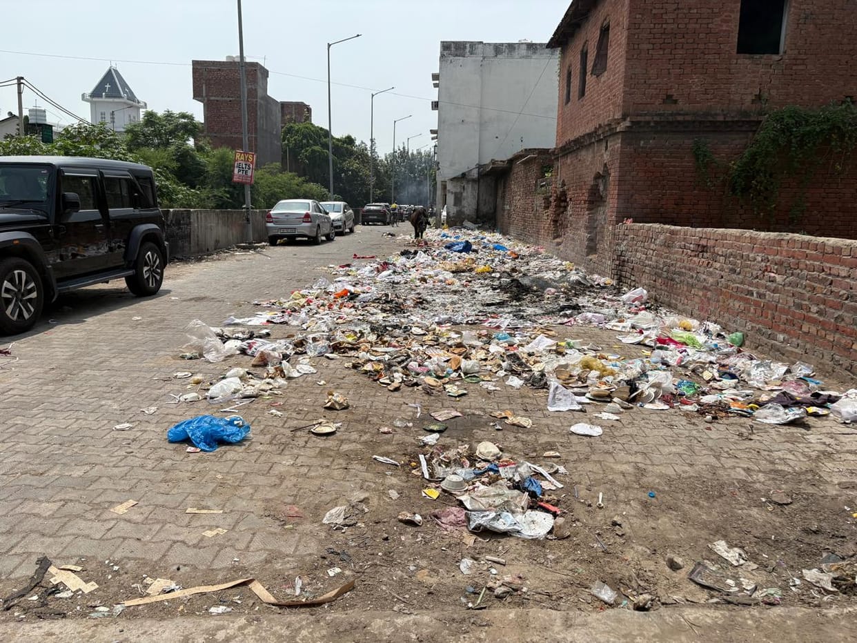 The stench rising from piles of garbage accumulated on the streets.