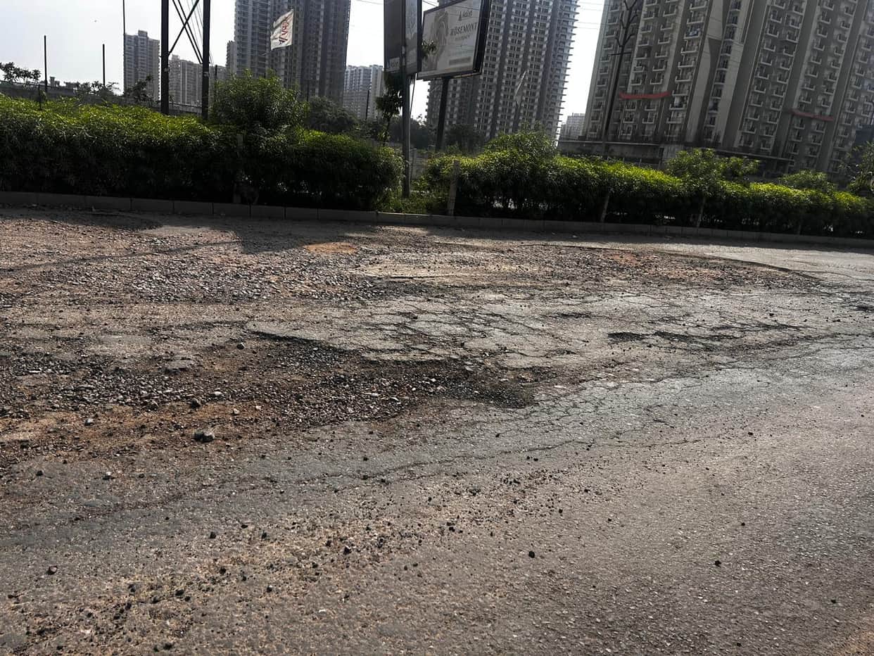 Road from Aditya World City to NH-9 in poor condition; residents facing trouble.
