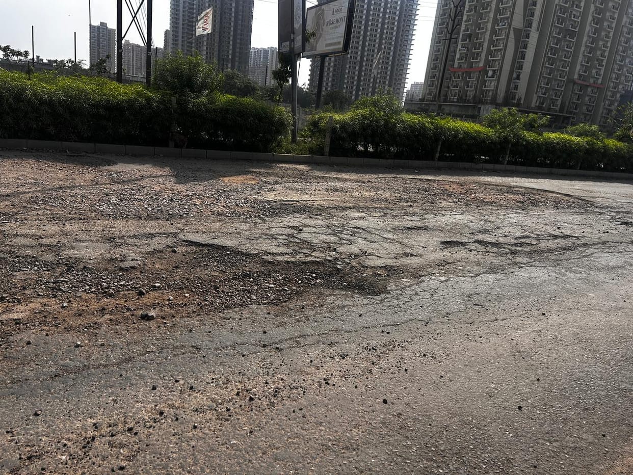 Road from Aditya World City to NH-9 in poor condition; residents facing trouble.