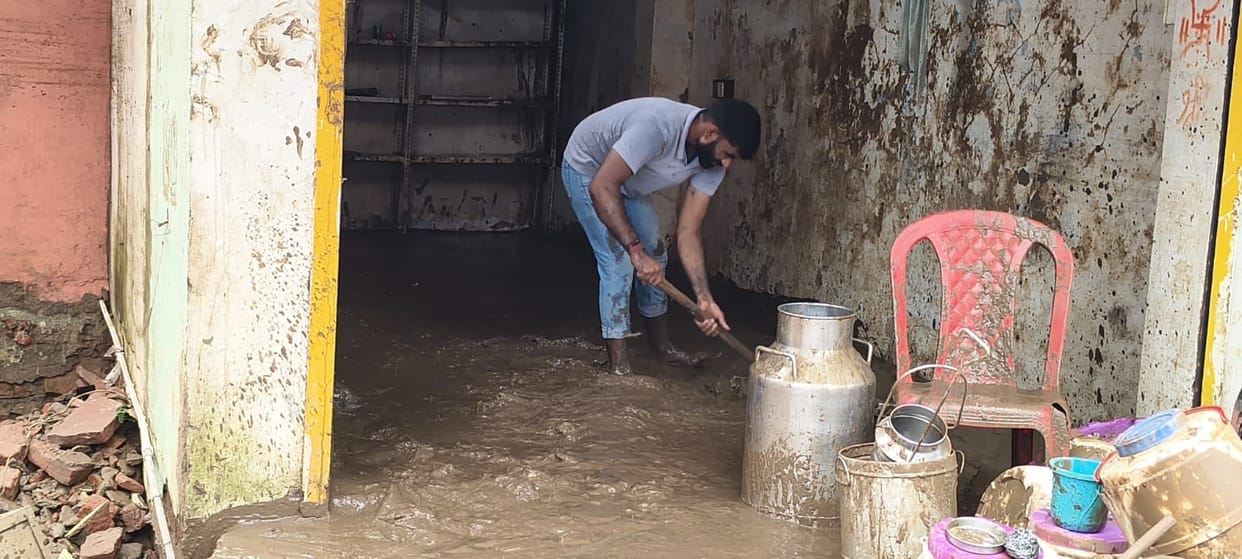 The Mandakini turned furious within an hour; shops closed, and shopkeepers fled.