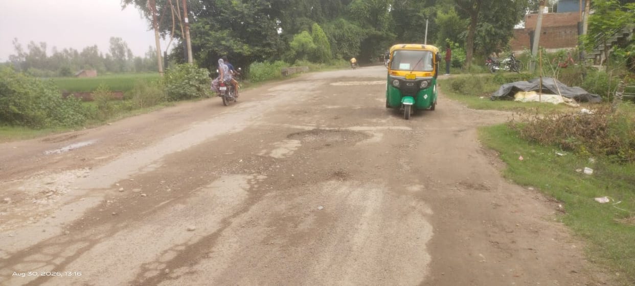 More potholes than road... danger lurks at every step on this highway.