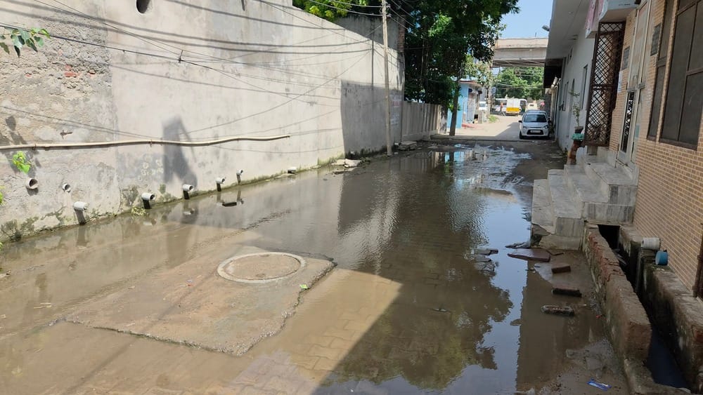 Forced to wade through dirty water to get to school or work.
