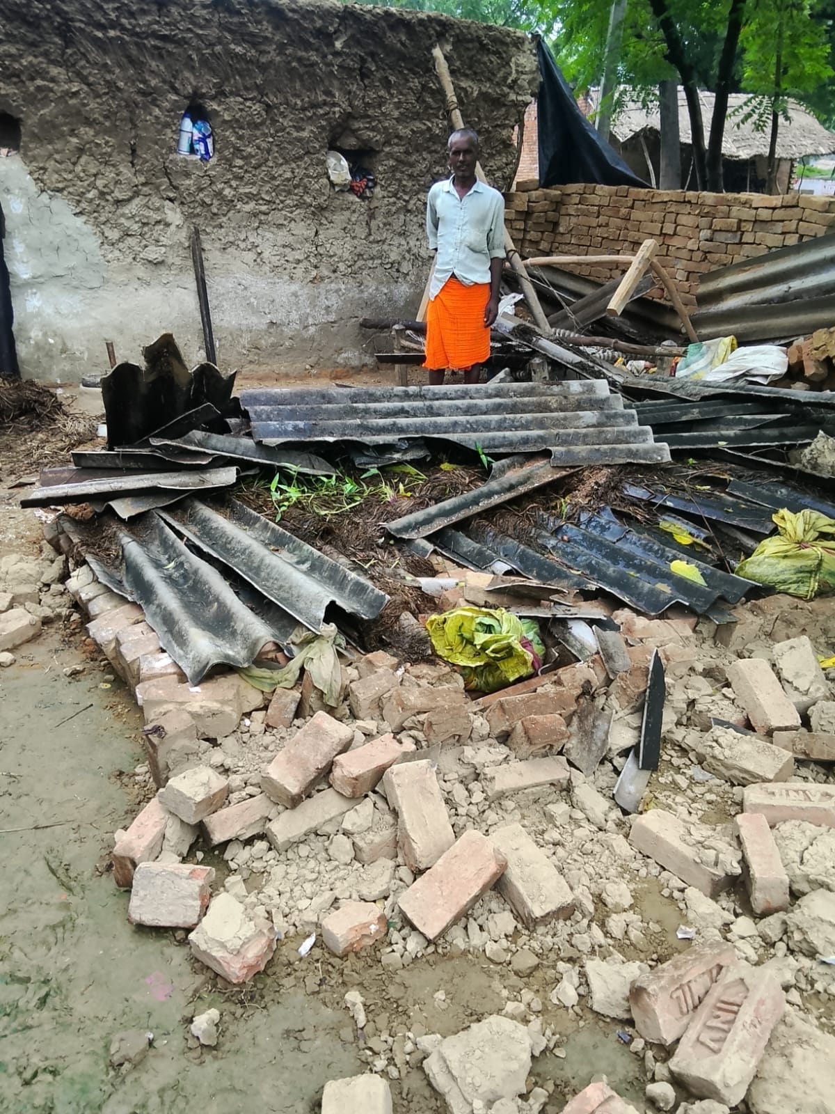 Rain snatches away roof; family, including six children, left homeless.