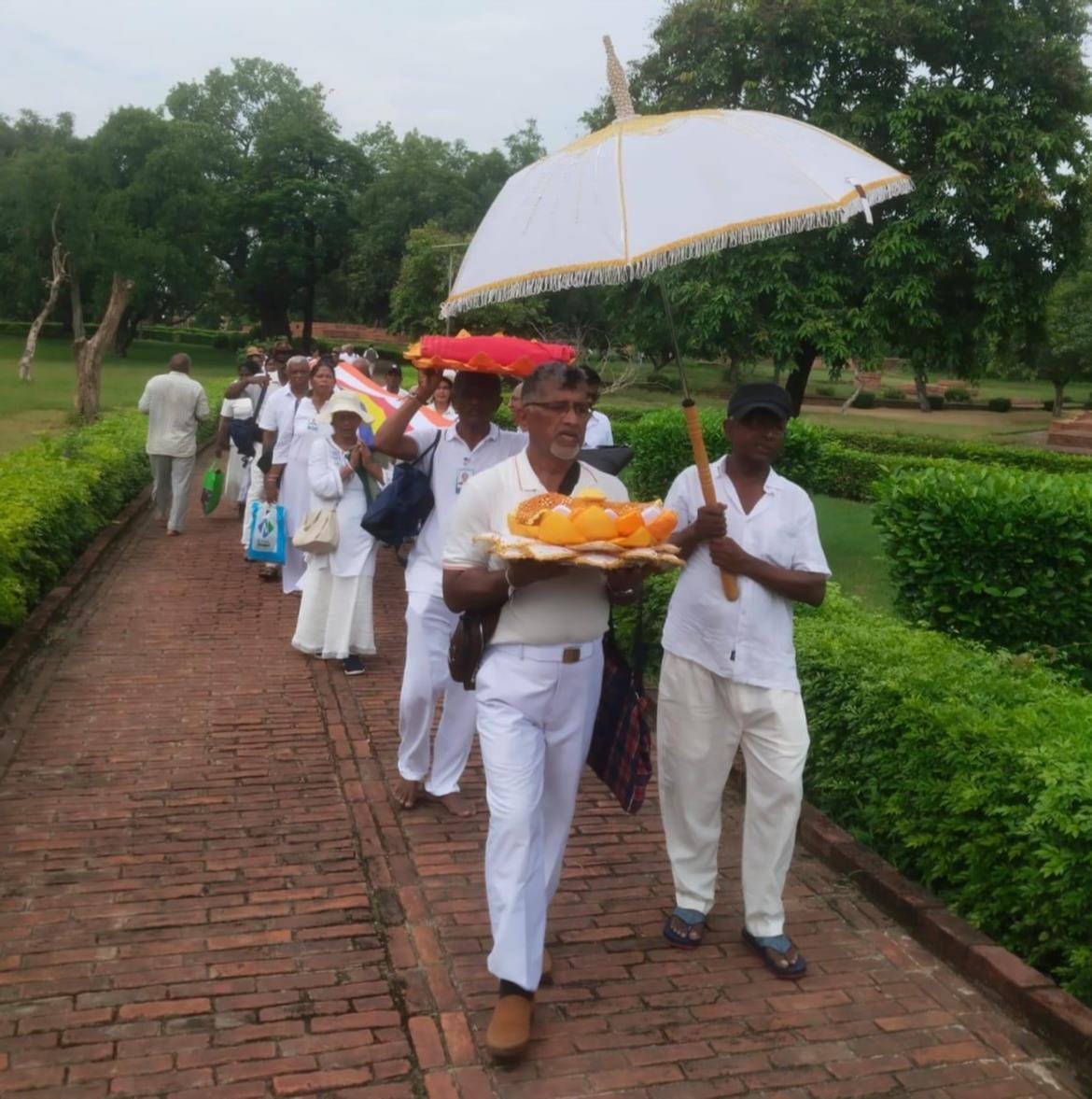 Buddhist monks' three-month rainy season retreat ritual begins.