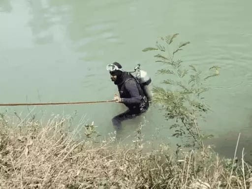 Dead body found in canal, divers engaged in search