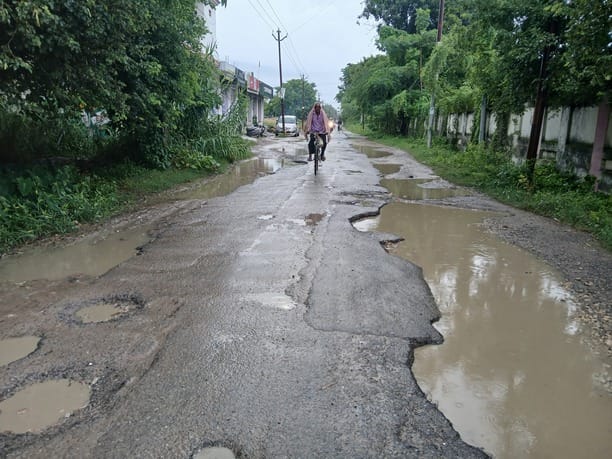 Road to Kendriya Vidyalaya, Polytechnic, and 30 villages riddled with potholes.