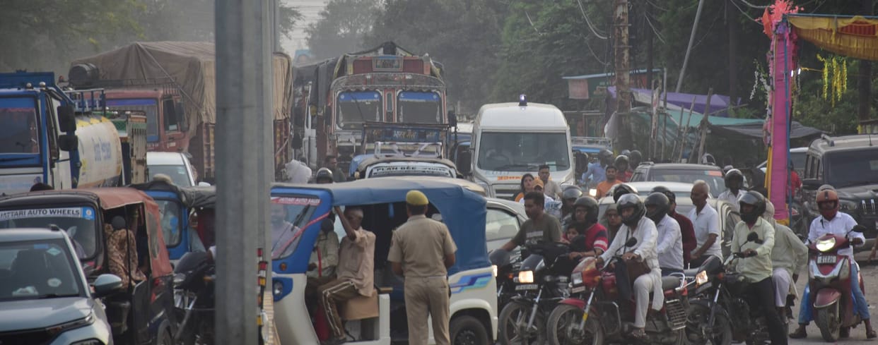 Several ambulances stuck in traffic jam; patients and attendants in a state of anxiety.