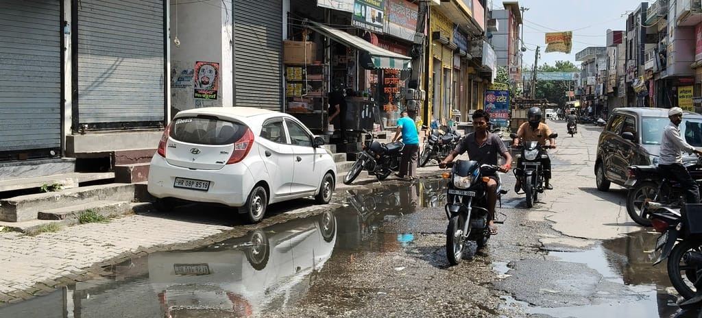 People in Indri's Naya Bazar troubled by overflowing drain.
