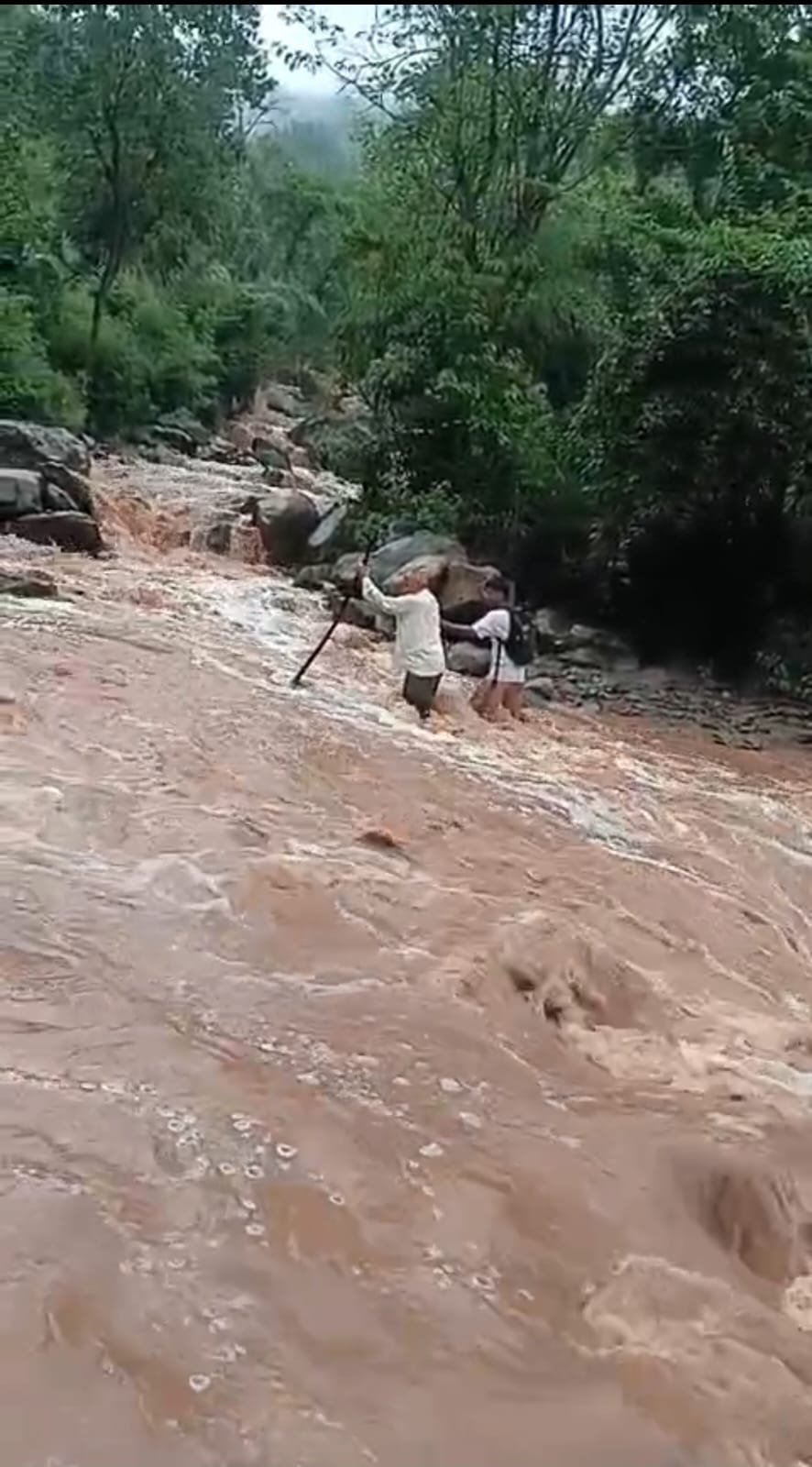 People are risking their lives to cross the Salga Khad due to the absence of a bridge.