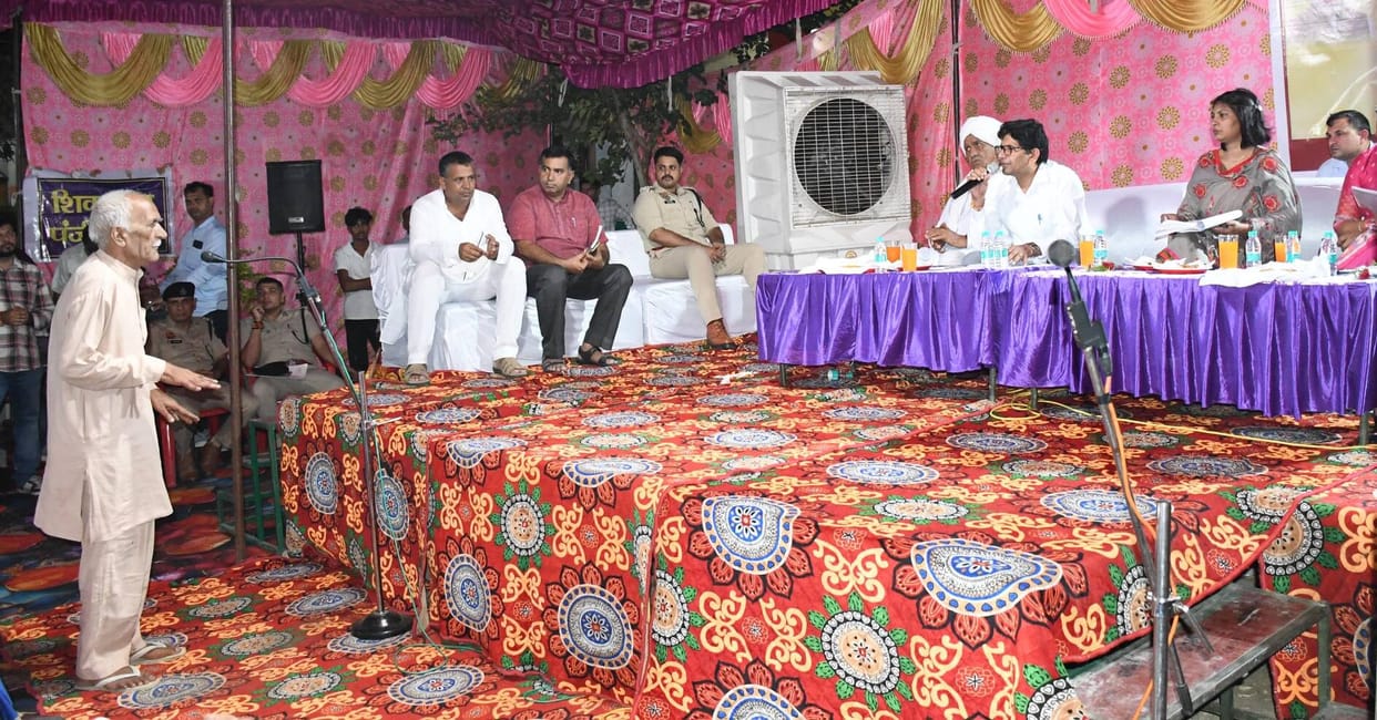 The DC stayed overnight and listened to the villagers' grievances.