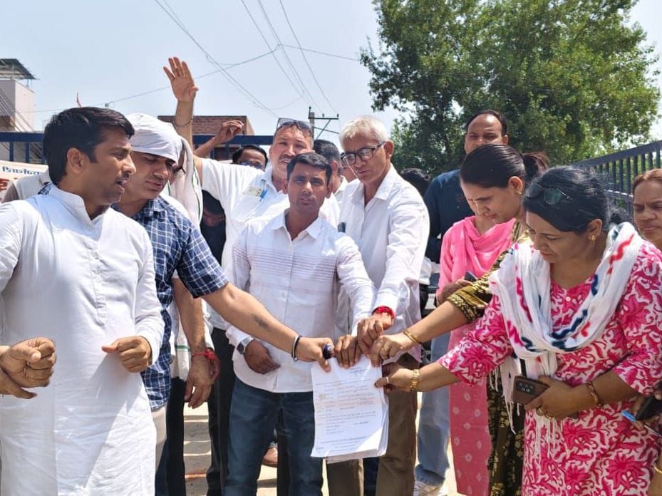 Electricity employees protested by burning copies of the HERC notice.