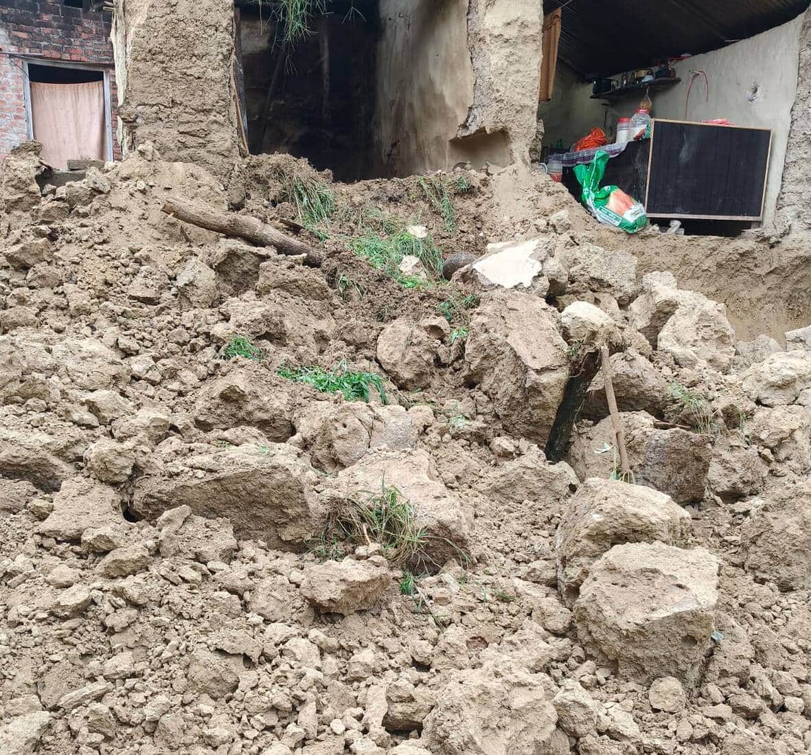 Heavy rain spells disaster; eight houses reduced to rubble.