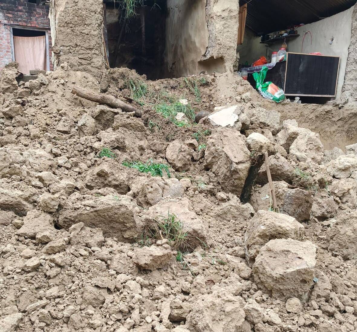 Heavy rain spells disaster; eight houses reduced to rubble.