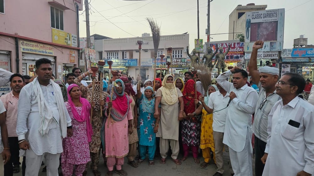 Sanitation workers took out a torchlight procession to press for their demands and raised slogans against the government.