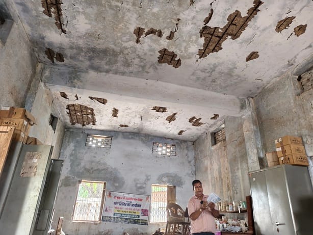 Government Ayurvedic Hospital building in a dilapidated state.