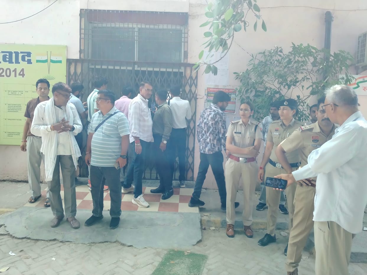 Garbage collection vehicles operated under police protection