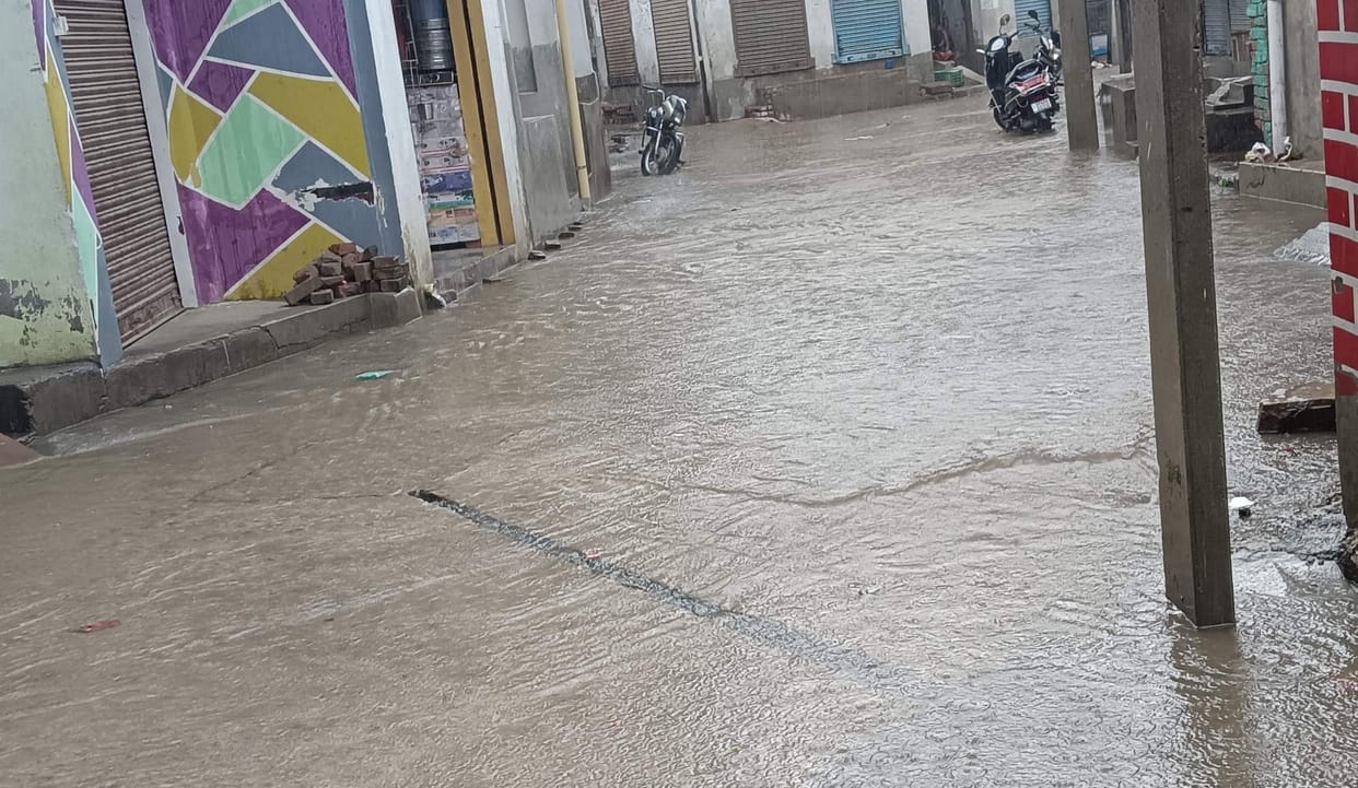 One hour of rain turns roads into ponds; traffic disrupted.