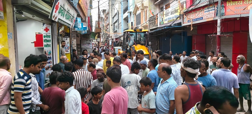 Encroachment removed using a bulldozer amidst heated exchanges.