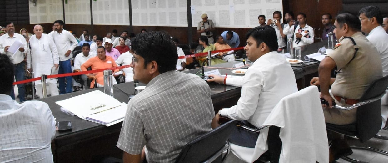 Clerk charge-sheeted over delay in Ladli Scheme; eight out of 12 grievances resolved on the spot.