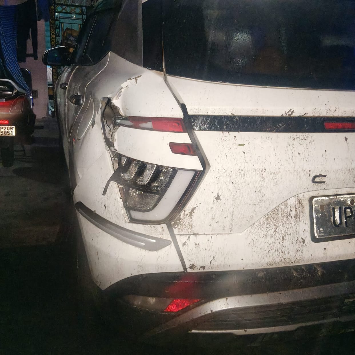 Tusker elephant wrecked a car and trampled crops, destroying them.