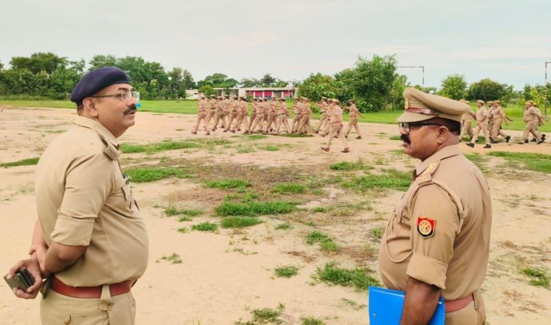 Police personnel made to run in a group.