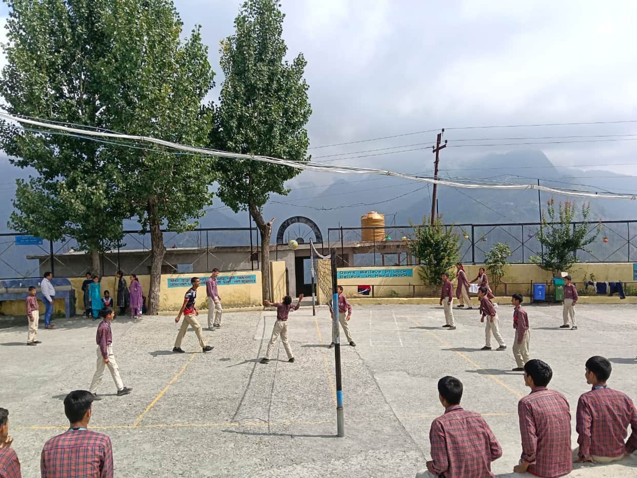 Singadhar School wins Under-14 volleyball trophy.