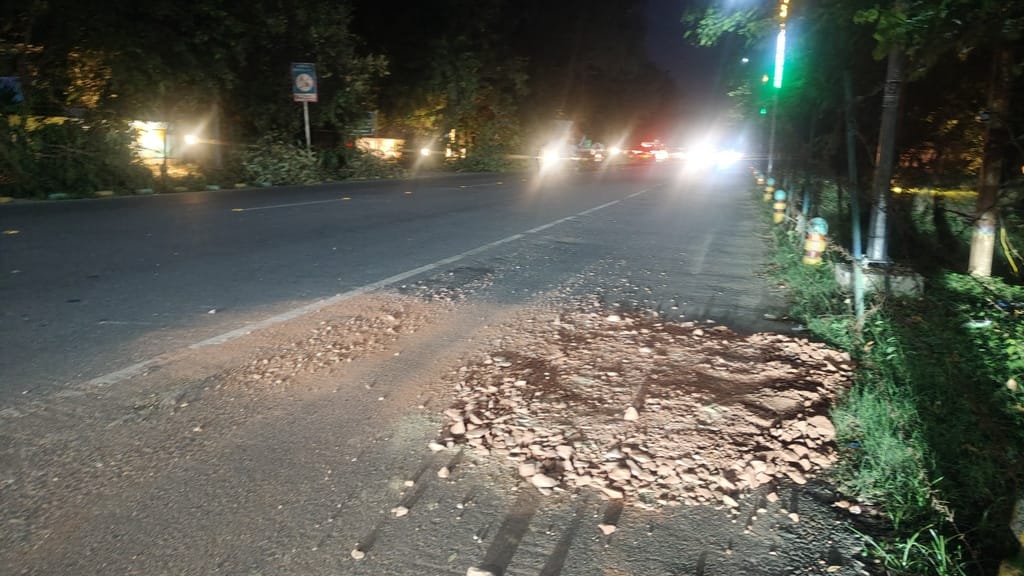 Pothole on VIP Road filled with crushed stone