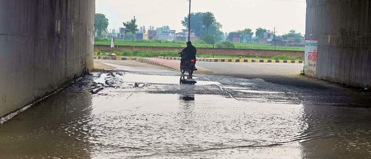 Traffic disrupted due to waterlogging in the highway underpass.