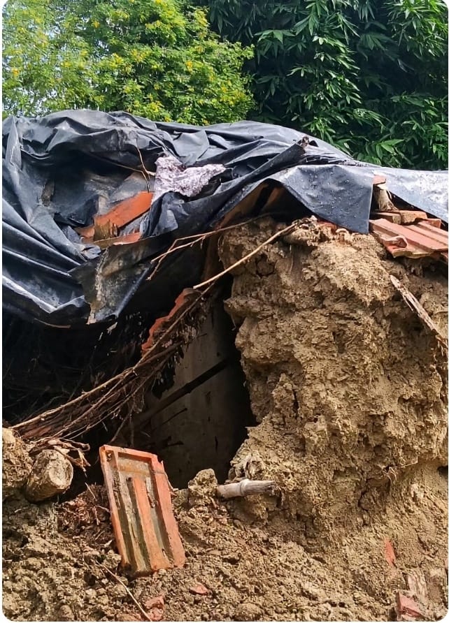 Mud house collapses due to rain; household belongings buried