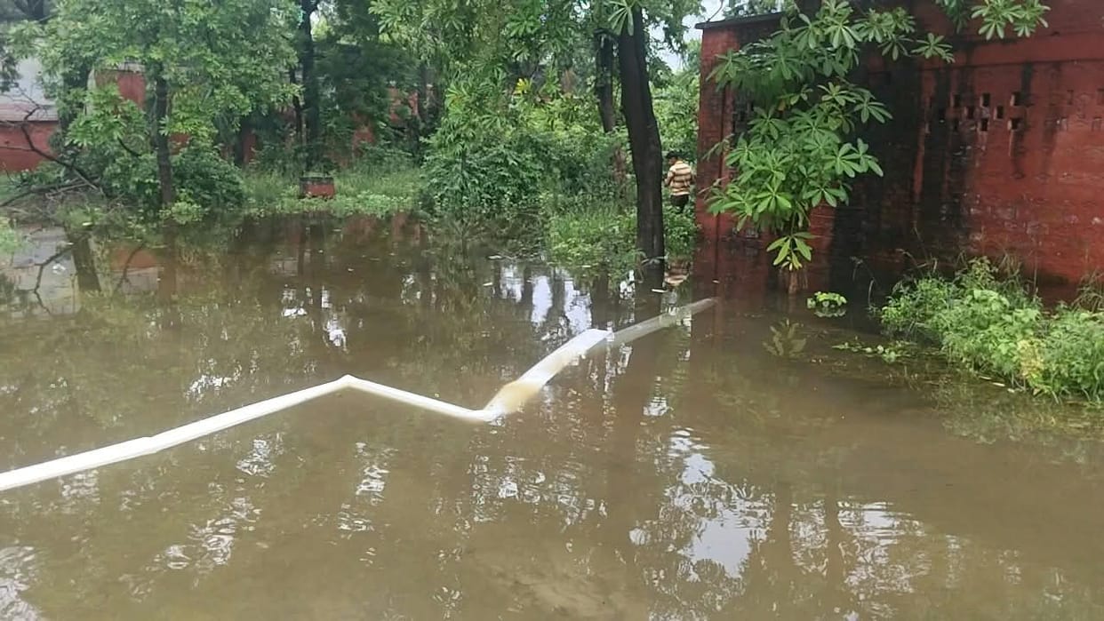 Two feet of water flooded the Industries Department office; work came to a halt.