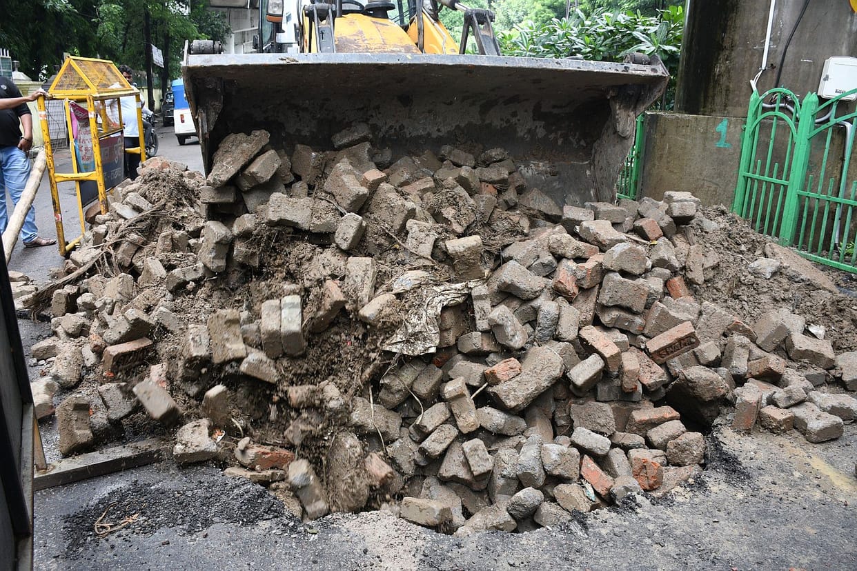 Road caves in front of MP Dr. Dinesh Sharma's residence; two motorcyclists fall