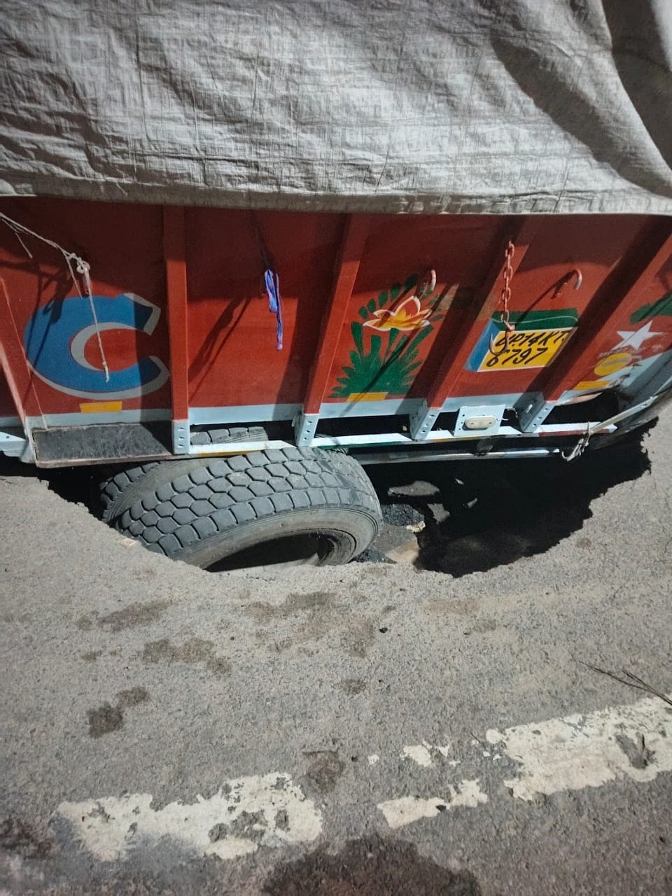 Rescue operation continued until 3 AM; truck had got stuck due to road cave-in.