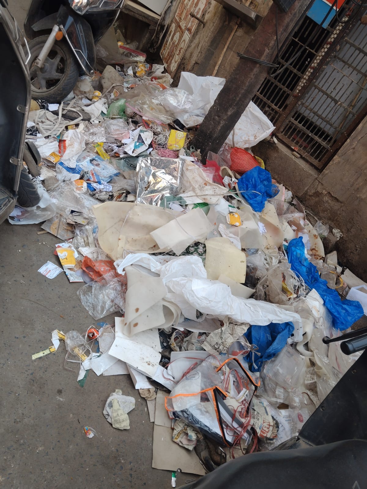 System amidst piles of garbage; strike over sanitation work.