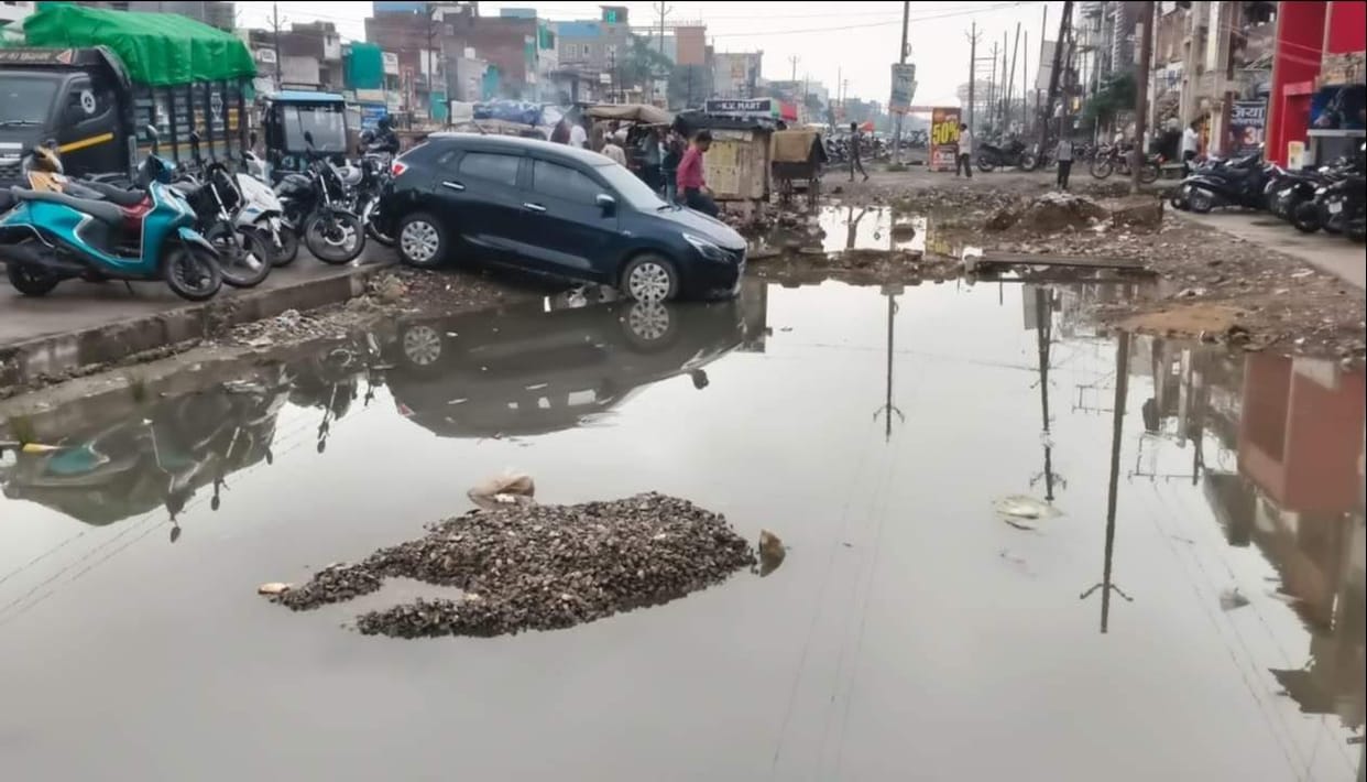 Service lane not constructed, more than 50 pits four feet deep dug five months ago and forgotten