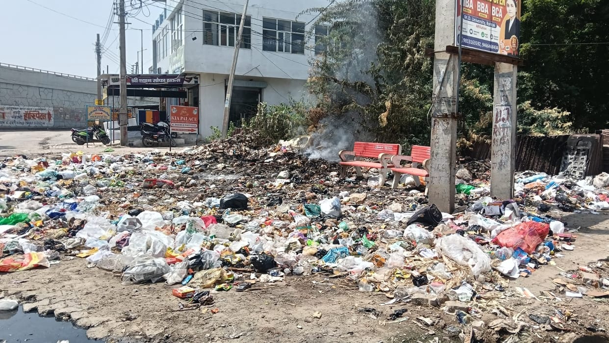 Potholes, raised manholes, and a foul stench... Tikona Market in distress