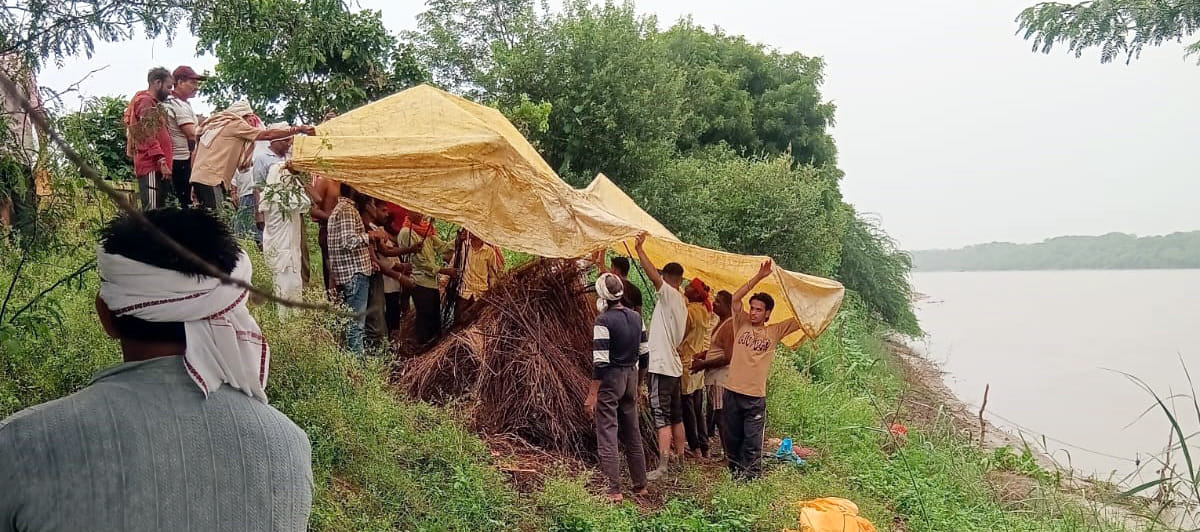 No respite even during the final journey; rain halts the funeral.