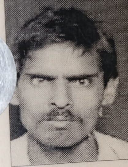 Body of elderly man run over by train identified after viewing photo on mobile phone.