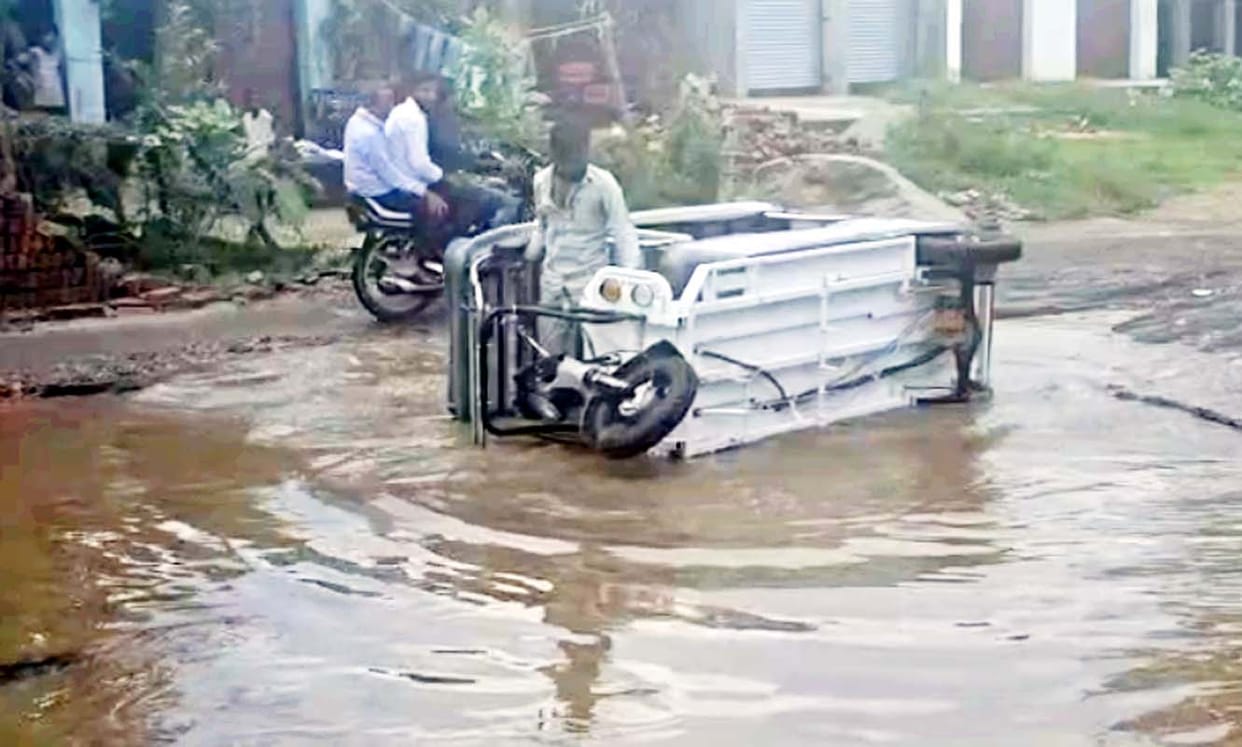 Plea went unheard... filled highway potholes at own expense.