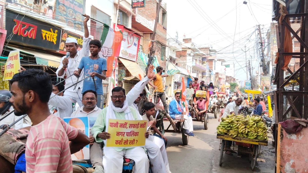 Procession taken out with a horse-drawn carriage on dilapidated roads.